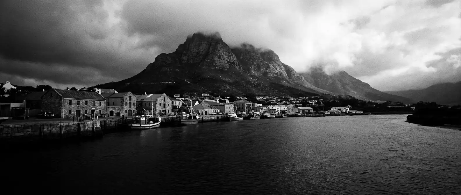 Hobart waterfront beneath kunanyi with cloud tearing across the summit, representing AI search visibility for Hobart businesses